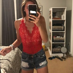 Red lace body suit